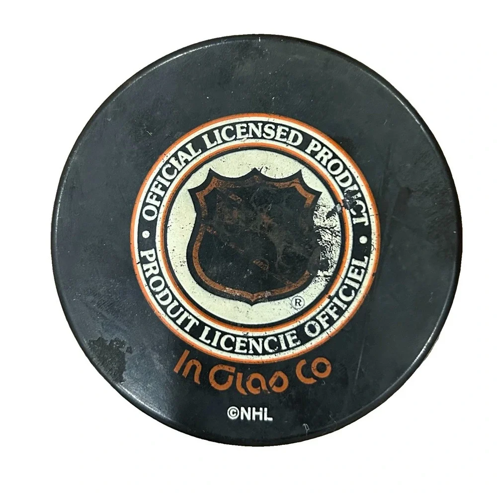 EST. 1993 VINTAGE A MIGHTY DECADE MIGHTY DUCKS NHL AAA & ESPN SPONSOR PUCK